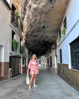 Setenil de las Bodegas is simple AMAZING! One of those places in Andalusia that makes you wonder how people came up with the idea of building a town like this?!

Its location is unique. Instead of building houses around the rocks, people built them underneath enormous rock overhangs, using the natural landscape as part of their homes. Walking through the town, you can find entire streets where the rock hangs right above your head, creating a very unusual mix of whitewashed houses and massive stone walls.

Two of the most famous streets are Calle Cuevas del Sol, where the sun reaches the houses, and Calle Cuevas de la Sombra, where the huge rock overhead keeps the street in the shade. And this contrast between light and shadow makes the town especially interesting to photograph.

Setenil de las Bodegas is part of Andalusia's famous white villages, but its architecture and unusual setting make it quite different from the others. 

#setenildelasbodegas #andalusia #spain #travel #travelphotographer