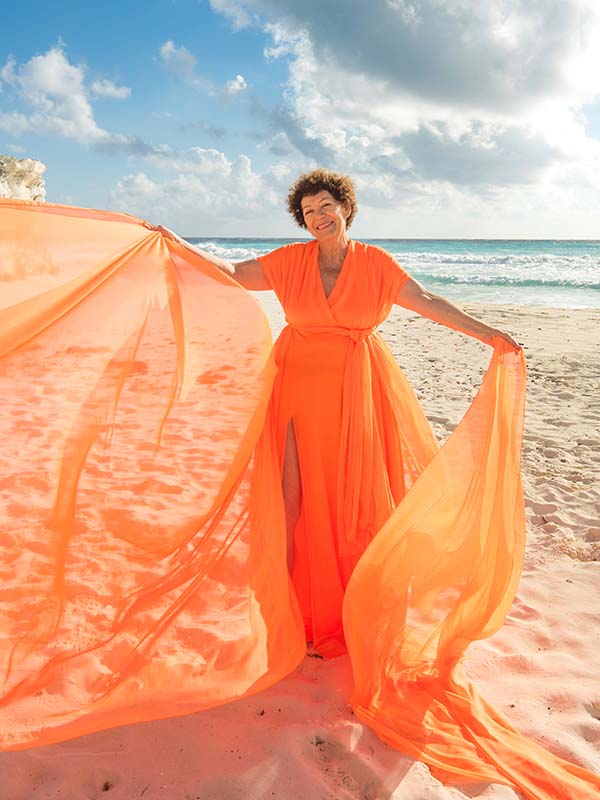 orange flying dress beach