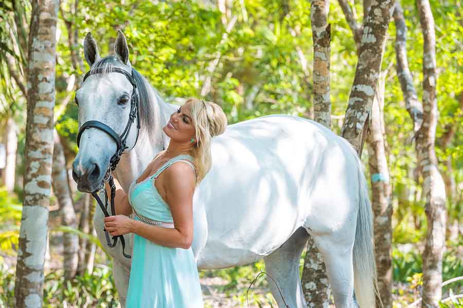 photoshoot on a white horse