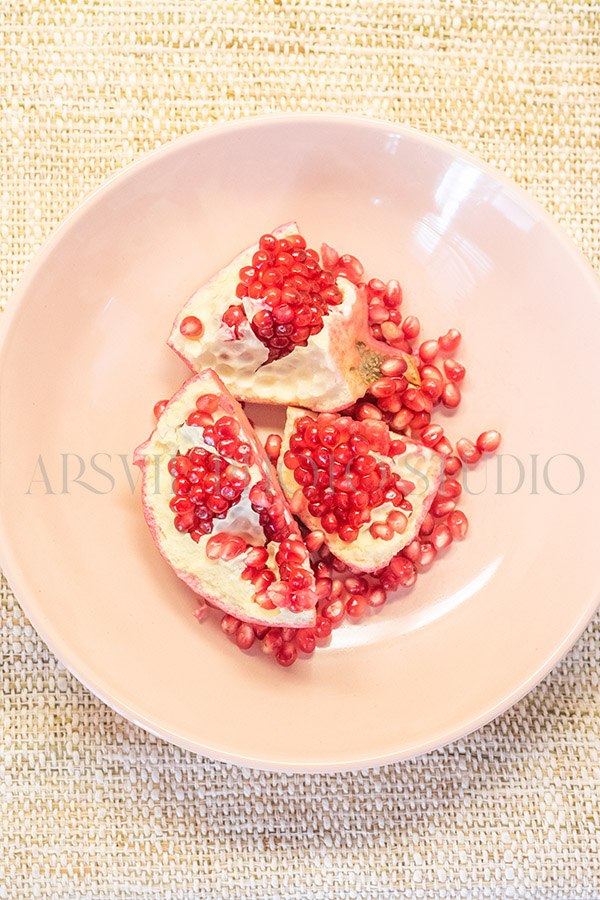pomegranate-on-plate-stock-photos
